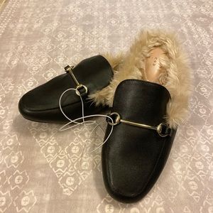 Black faux fur slides